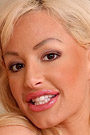 Kelly Lenox Plays with a Pink Toy