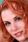Genny Red Spreads Her Pussy