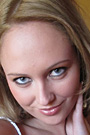 Nolana Teases Herself with a Feather